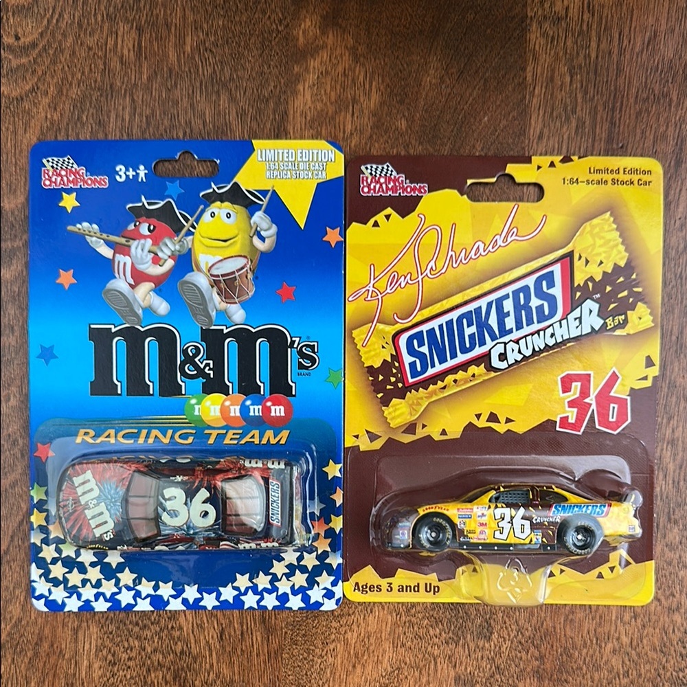 3 Diecast Cars 1:64. Snickers Cruncher and m&m’s Racing Champions.